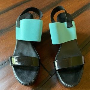 Stylish wedge, sling back sandals.